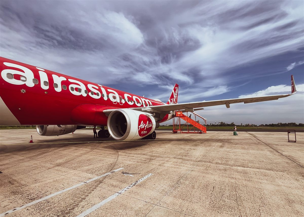 AirAsia Airbus on the apron under a wide sky